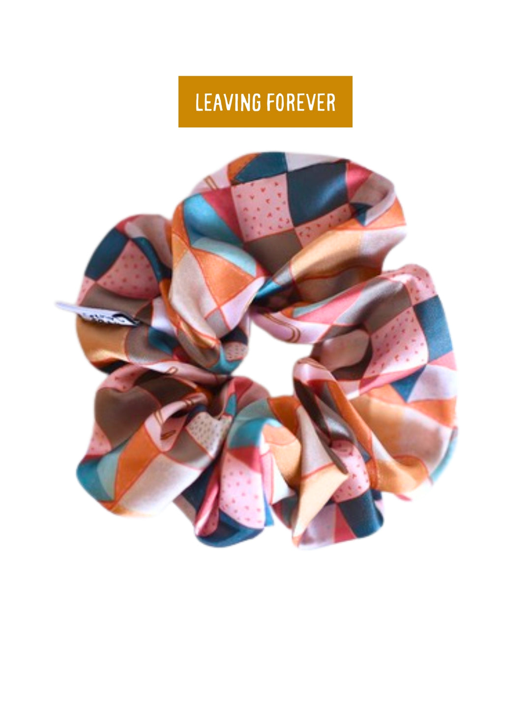 Vintage Patchwork scrunchie in satin with a patchwork print in blush, teal and rust, marked Leaving Forever