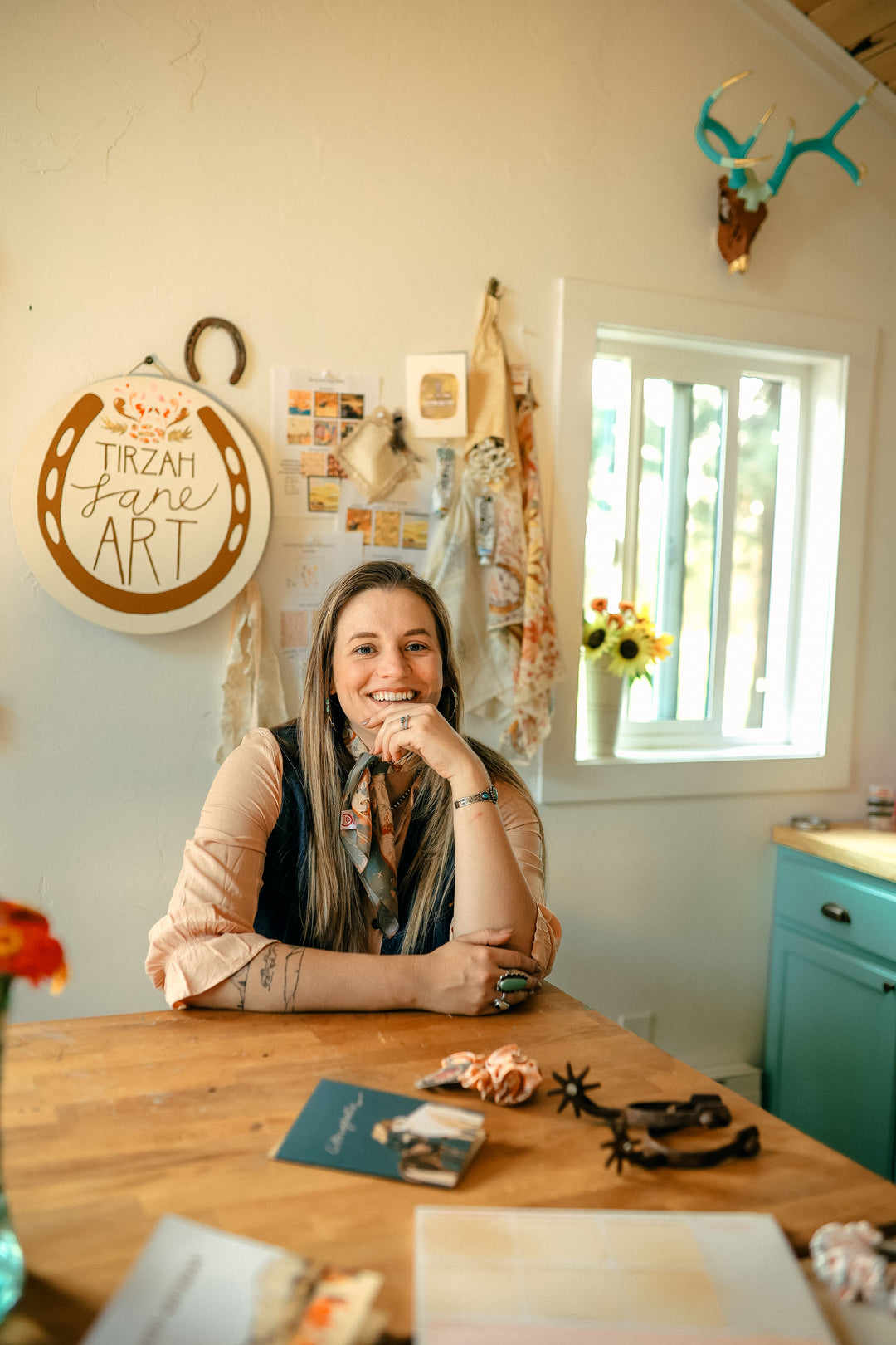 Western artist Tirzah Lane in her art studio in Central Oregon